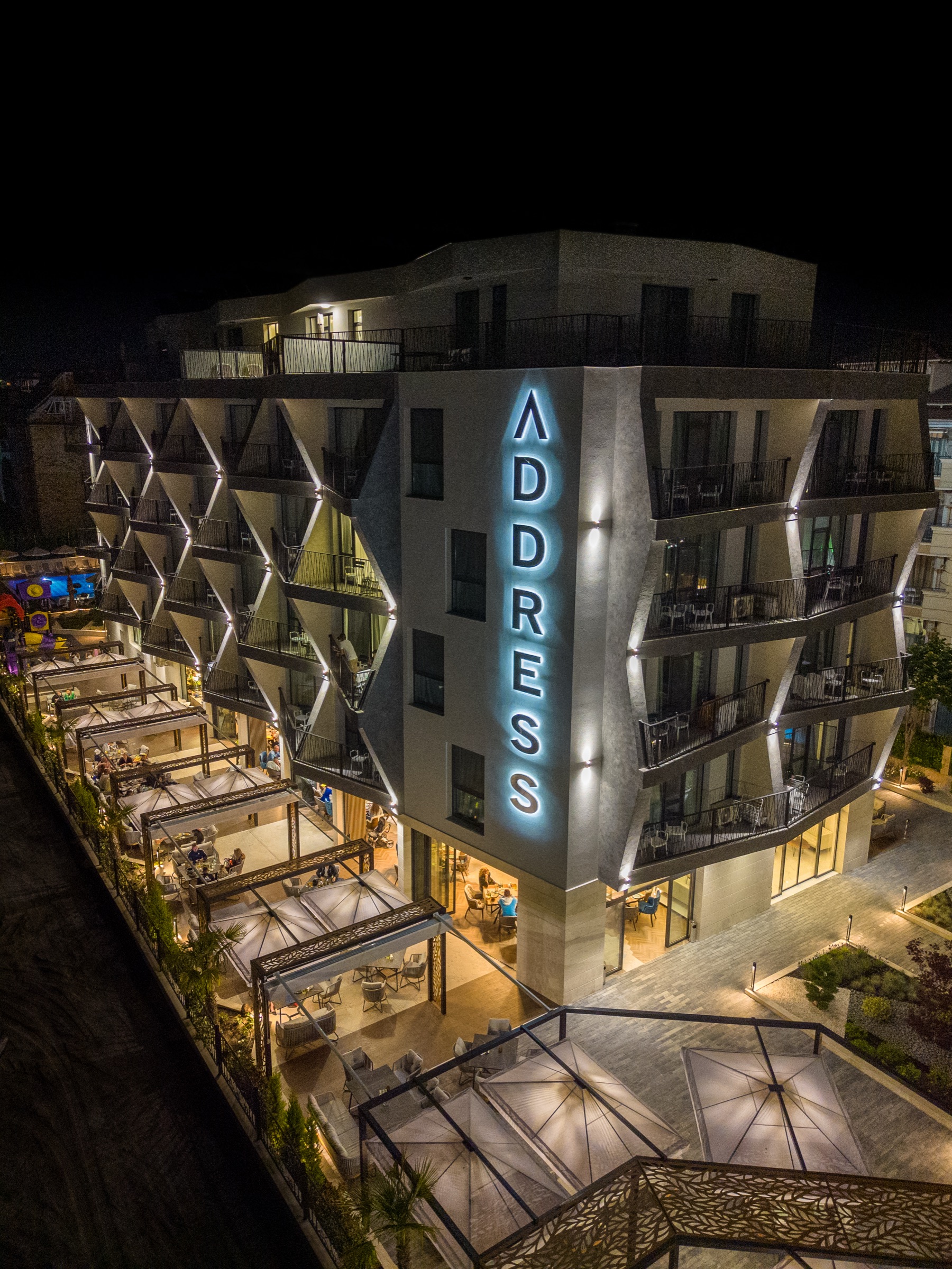 Hotel Address at night, drone