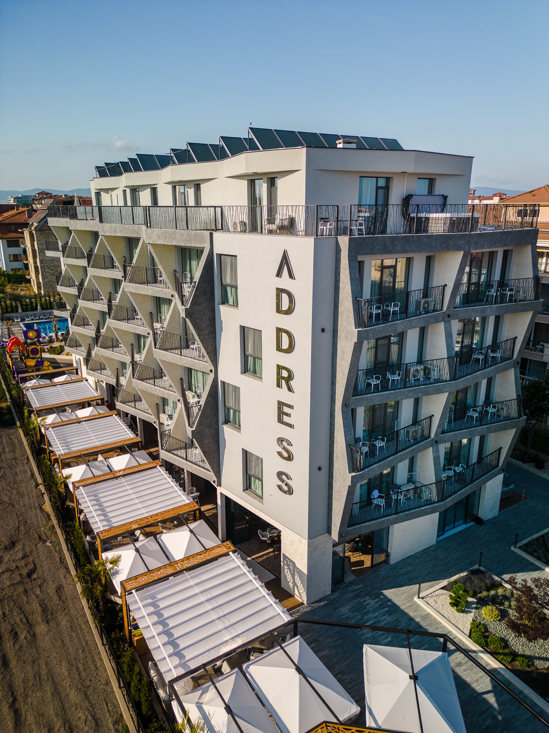 The facade by day, drone